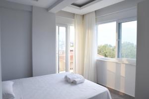 Postel nebo postele na pokoji v ubytování SORAL APART