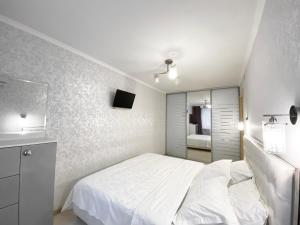 Posteľ alebo postele v izbe v ubytovaní Beautiful 1-bedroom near Most City Center