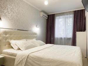 Posteľ alebo postele v izbe v ubytovaní Beautiful 1-bedroom near Most City Center