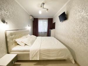 Posteľ alebo postele v izbe v ubytovaní Beautiful 1-bedroom near Most City Center