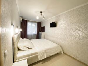 Posteľ alebo postele v izbe v ubytovaní Beautiful 1-bedroom near Most City Center