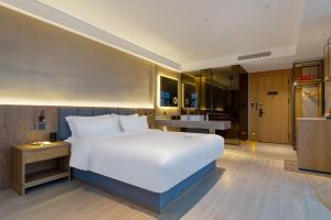 TRUE Go hotel客房内的一张或多张床位