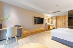 TRUE Go hotel客房内的一张或多张床位