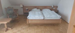 Krevet ili kreveti u jedinici u objektu Hotel Pension Am Engelsberg