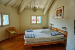 Säng eller sängar i ett rum på VillaDorien by Viglamo