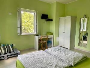 Postel nebo postele na pokoji v ubytování Impronte Nel Bosco + 34 fotografií