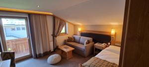 Postel nebo postele na pokoji v ubytování Hotel Bergkristall + 37 fotografií