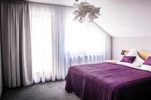 Postel nebo postele na pokoji v ubytování Hotel Restaurant Na Návsi