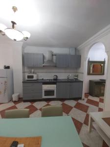 Kuchyň nebo kuchyňský kout v ubytování Apartamento El Sol