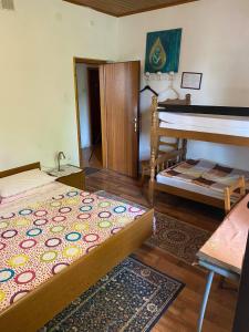 Postel nebo postele na pokoji v ubytování B&B LOKEV Sezana