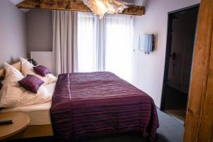 Postel nebo postele na pokoji v ubytování Hotel Restaurant Na Návsi