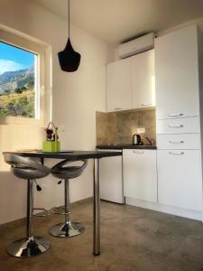 Dapur atau dapur kecil di Almond Apartments