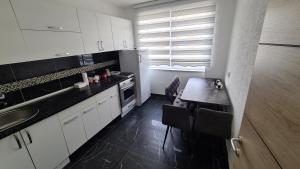 Η κουζίνα ή μικρή κουζίνα στο Galata Vip apartment
