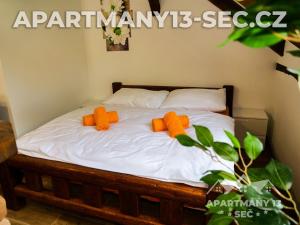 Katil atau katil-katil dalam bilik di Apartmánový dům 13 Podkroví 2