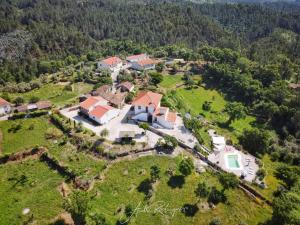 an aerial view of a house on a hill at Quinta Quatro Ventos in Sertã