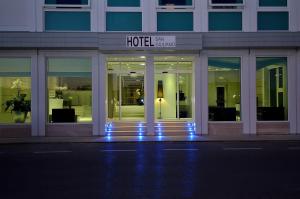 a hotel with a sign on the front of a building at Hotel San Giuliano in Mestre