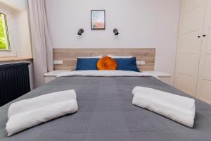 Postel nebo postele na pokoji v ubytování Hostel Szczelinka