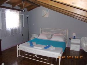 Posteľ alebo postele v izbe v ubytovaní Carmen maisonette