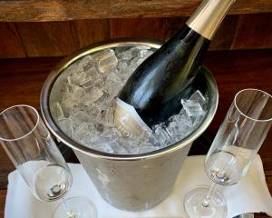a bottle of wine in a bucket of ice at boon hotel + spa - adults only in Guerneville