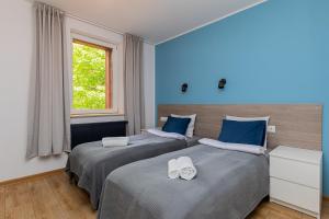 Postel nebo postele na pokoji v ubytování Hostel Szczelinka