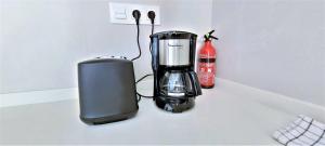 Coffee and tea making facilities at Cozy White Home in Getxo