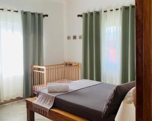 Postel nebo postele na pokoji v ubytování Chez Coco