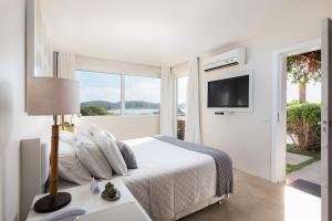Voodi või voodid majutusasutuse Abracadabra Boutique Hotel toas