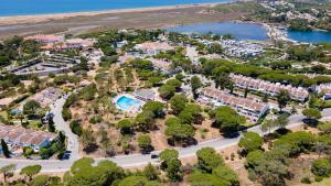 an aerial view of a resort with a pool at Victory Village Quinta do Lago - Spacious 2 Bed / 3 Bath Apartment in Almancil