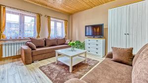 Posezení v ubytování Apartmány v Novém Městě pod Smrkem