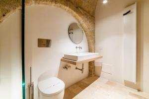 Een badkamer bij Tre Archi Suite & Relais