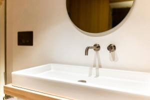 Een badkamer bij Tre Archi Suite & Relais