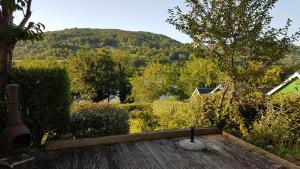 a view of a garden from the roof of a house at COTTAGE - Lac du Causse in Chasteaux