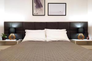 Katil atau katil-katil dalam bilik di Apartamento Aluri