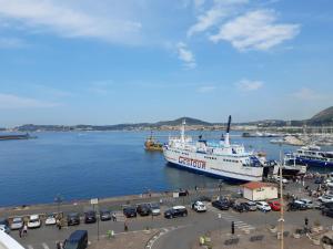 a large boat is docked in a harbor at Relais Vista Mare in Pozzuoli