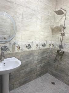 Een badkamer bij Guest House ETM
