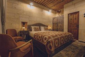 Posteľ alebo postele v izbe v ubytovaní Vasıl Cave Hotel
