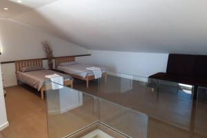 a living room with a glass table and a couch at For Families Only - Casa Nora Novigrad in Novigrad Istria +20 photos