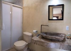 Ванная комната в Hotel Casa del Arbol