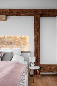 Posteľ alebo postele v izbe v ubytovaní Florand Rooms&Wine