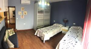 Posteľ alebo postele v izbe v ubytovaní Apartamento Entre el Falla y la Caleta