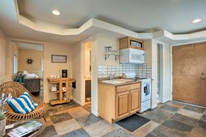 a kitchen with a sink and a stove at Brookings Vacation Rental Studio - Walk to Town! in Brookings