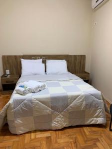 Cama ou camas em um quarto em Hotel E Turismo São Simão