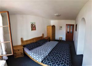 Postel nebo postele na pokoji v ubytování Apartment Galerie Marie