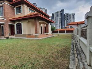 a house with a yard in front of a city at PH Homestay Bungalow House at PJ Fully Equipped in Petaling Jaya