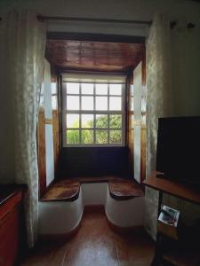 A television and/or entertainment centre at CASA DE LA CRUZ