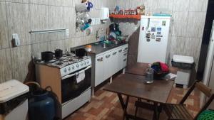 Kuchyň nebo kuchyňský kout v ubytování Hostel Aventura + 12 fotografií