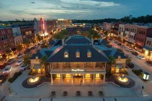 an aerial view of a building in a city at night at Amazing TEXAS House 3 Bed in The Woodlands in Spring