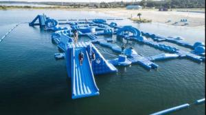 a water park with blue slides in the water at Gorgeous Seaside Seashell Cottage! in Hudson