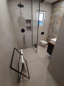Koupelna v ubytování Apartments Dile