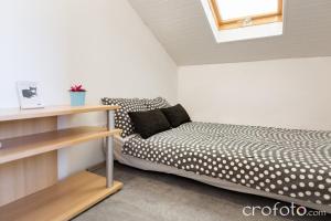 Postel nebo postele na pokoji v ubytování Apartments & Rooms Laganini